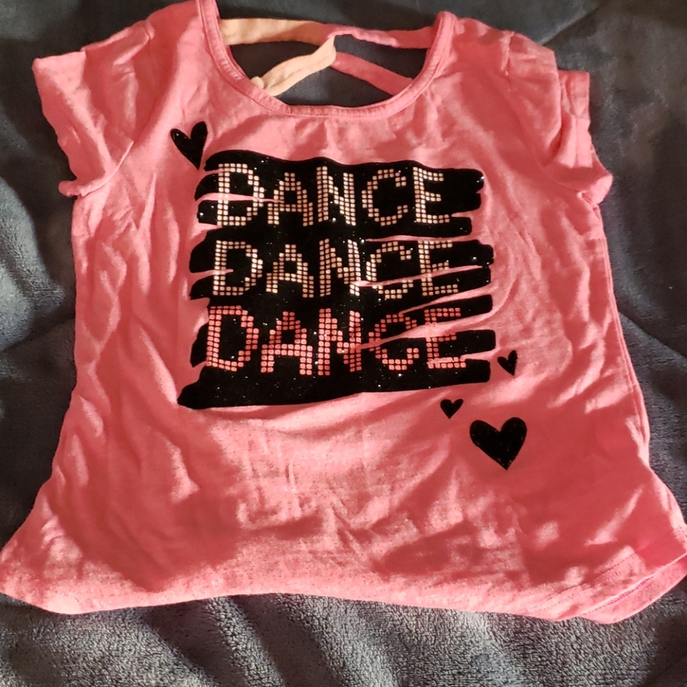 Girl's shirt saying "DANCE DANCE DANCE"